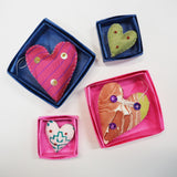 Cloth Hearts in Paper Boxes
